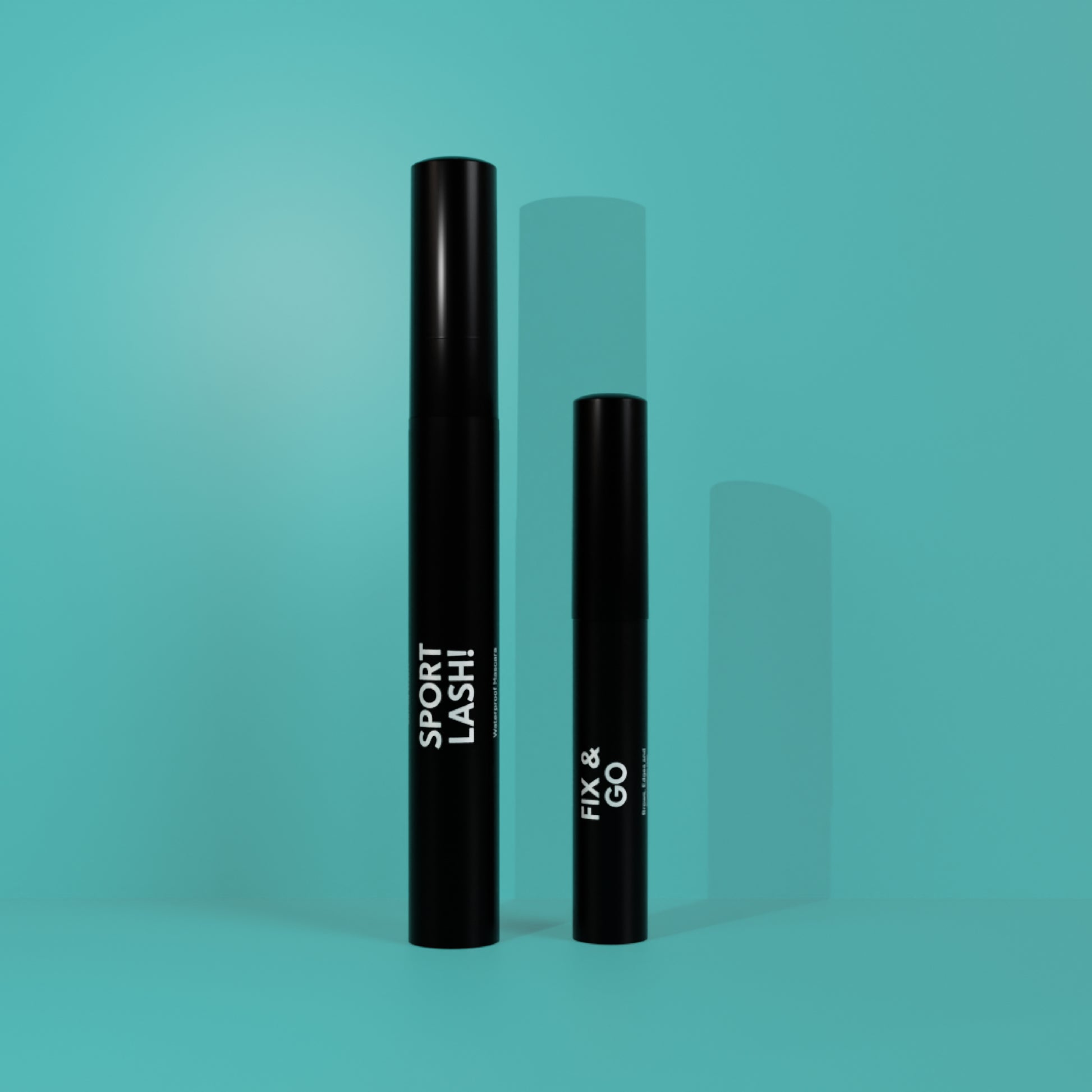 A set of Motion Beauty Sport Lash Waterproof Mascara and the Fix & Go gel on an aquamarine background.